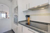 Kuchyň nebo kuchyňský kout v ubytování Spacious apartment Puerto Alto