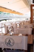 a pile of boxes sitting on top of a table at Auberge du Lyonnais in Annecy