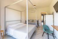 A bed or beds in a room at Villa Oidor - Cilento