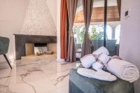 A bed or beds in a room at Villa Oidor - Cilento