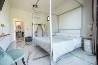 A bed or beds in a room at Villa Oidor - Cilento