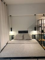 Postel nebo postele na pokoji v ubytování E2G URBAN STAY, #E