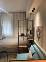 Postel nebo postele na pokoji v ubytování E2G URBAN STAY, #E
