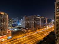 Nespecifikovaný výhled na destinaci Dubaj nebo výhled na město při pohledu z apartmánu