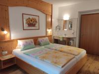 Posteľ alebo postele v izbe v ubytovaní Appartements Pfausler