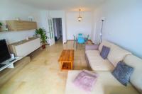 Posedenie v ubytovaní Very lightful apartment. Incredible sea views. Big terrace, Swimming pool. AC. Very close to Alicante city center.