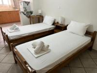 Posteľ alebo postele v izbe v ubytovaní Athina Rooms