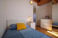 Posteľ alebo postele v izbe v ubytovaní Casa Bellavista 2