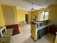 a kitchen with yellow walls and a counter top at Maison Pradons, 4 pièces, 6 personnes - FR-1-697-24 in Pradons