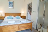 Ein Bett oder Betten in einem Zimmer der Unterkunft Tewitfield Marina