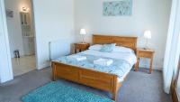 Ein Bett oder Betten in einem Zimmer der Unterkunft Tewitfield Marina