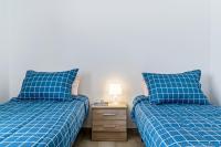 Postel nebo postele na pokoji v ubytování Barlovento Apartment