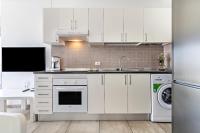 Kuchyň nebo kuchyňský kout v ubytování Barlovento Apartment