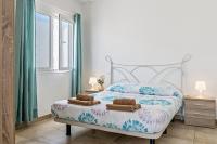 Postel nebo postele na pokoji v ubytování Barlovento Apartment