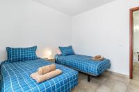 Postel nebo postele na pokoji v ubytování Barlovento Apartment
