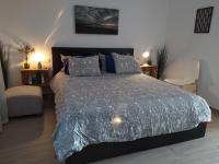 Posteľ alebo postele v izbe v ubytovaní Aqua Apt Sunrise & Sea Views