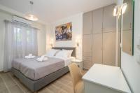 Postel nebo postele na pokoji v ubytování Ilias Apartments