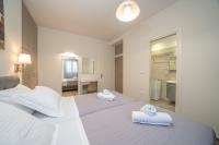 Postel nebo postele na pokoji v ubytování Ilias Apartments