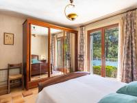 Posteľ alebo postele v izbe v ubytovaní Villa Maison de l'Hubac Bleu by Interhome