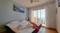Postel nebo postele na pokoji v ubytování Duplex MIRADOR