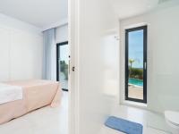Posteľ alebo postele v izbe v ubytovaní Villa Villa Adonia by Interhome