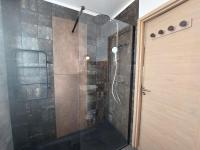 a shower with a glass door in a bathroom at Holiday Home Saint-Colomban-2 by Interhome in Carnac