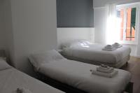 Albergo Augusta B&Bにあるベッド