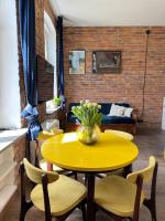 Posedenie v ubytovaní Lofts Cracow Apartments - City Center