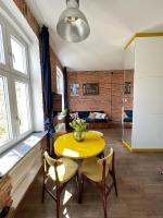 Posedenie v ubytovaní Lofts Cracow Apartments - City Center