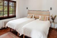 Postel nebo postele na pokoji v ubytování Villa Ventisca