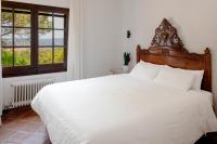 Postel nebo postele na pokoji v ubytování Villa Ventisca