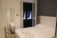 Albergo Augusta B&Bにあるベッド