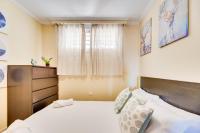 Łóżko lub łóżka w pokoju w obiekcie VB Marysol - 2BR apartment close to the beach