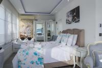 Postel nebo postele na pokoji v ubytování Dantela Butik Hotel