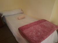 Postel nebo postele na pokoji v ubytování Sun house