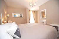 Posteľ alebo postele v izbe v ubytovaní Tinel Rooms Old City Center