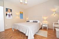 Posteľ alebo postele v izbe v ubytovaní Tinel Rooms Old City Center