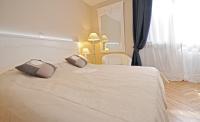 Posteľ alebo postele v izbe v ubytovaní Tinel Rooms Old City Center