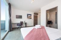 Posteľ alebo postele v izbe v ubytovaní Luxury Villa Noemi