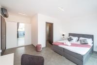 Posteľ alebo postele v izbe v ubytovaní Luxury Villa Noemi
