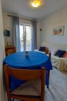 Posteľ alebo postele v izbe v ubytovaní Apartments by the sea Cove Mulobedanj, Pag - 6275