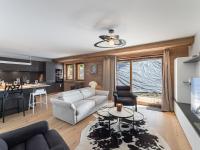 Część wypoczynkowa w obiekcie Appartement de Standing à Megève, 5 Min des Pistes, Sauna, Hammam, Parking, Animaux Acceptés - FR-1-569-52