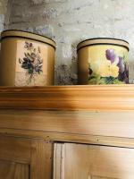 two vases sitting on top of a wooden shelf at Au bout du pré in Pézenas