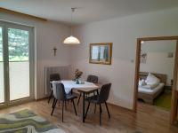 A bed or beds in a room at Appartementanlage Thermenblick SKI IN & SKI OUT