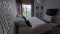 Postel nebo postele na pokoji v ubytování Apartamento La Ilusión - Cariño
