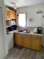 Kuchnia lub aneks kuchenny w obiekcie Cottage Charmant 2 personnes proche de la mer