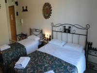 A bed or beds in a room at Castle View Studios