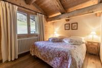 Łóżko lub łóżka w pokoju w obiekcie La Ferme du Var