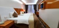 Postel nebo postele na pokoji v ubytování Bulvar Hotel
