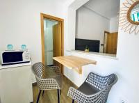 Kuchyň nebo kuchyňský kout v ubytování Apartamentos Turísticos Santo Rostro